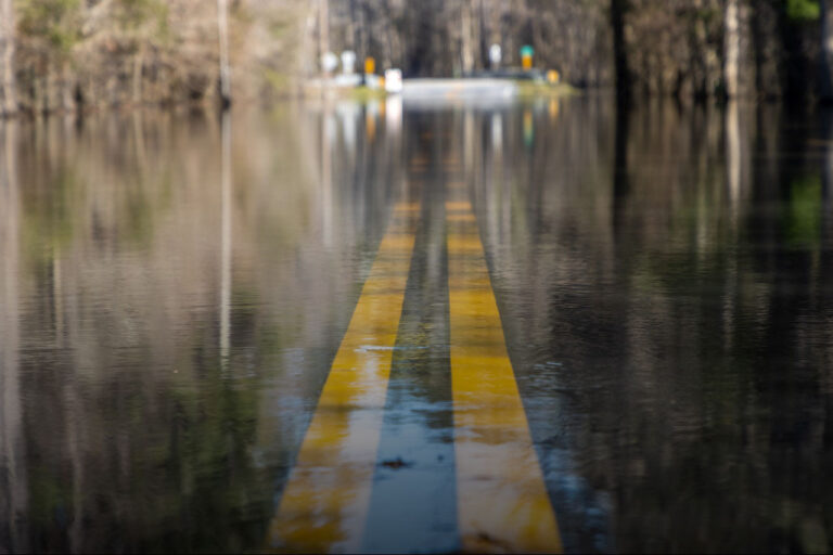 roadway flooded with water