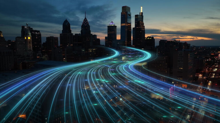 New York City Skyline at night with image of neon lines going through the city